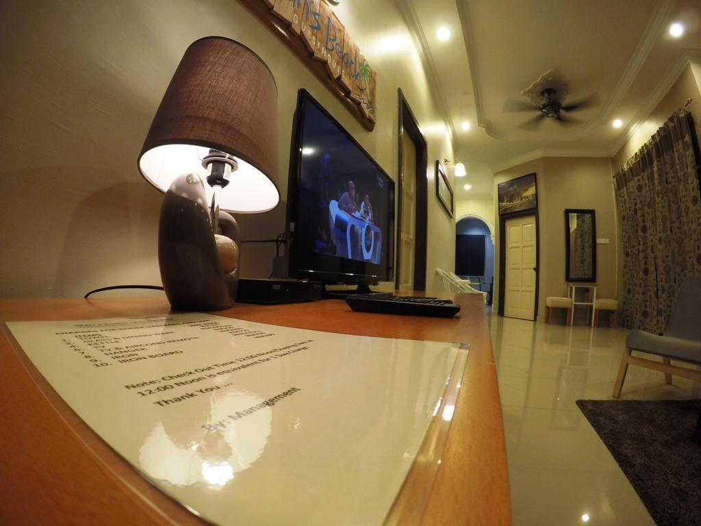 Wan's Beach Guest House Dungun Zimmer foto