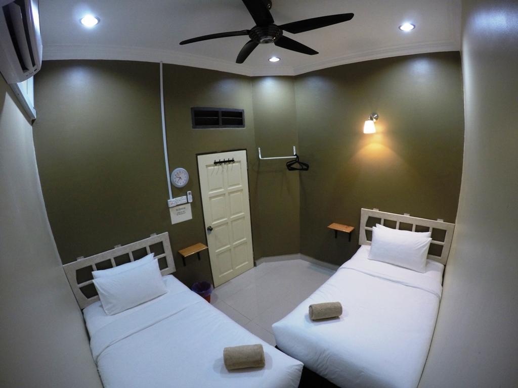 Wan's Beach Guest House Dungun Zimmer foto