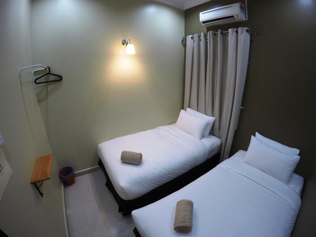Wan's Beach Guest House Dungun Zimmer foto