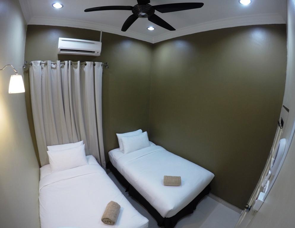 Wan's Beach Guest House Dungun Zimmer foto