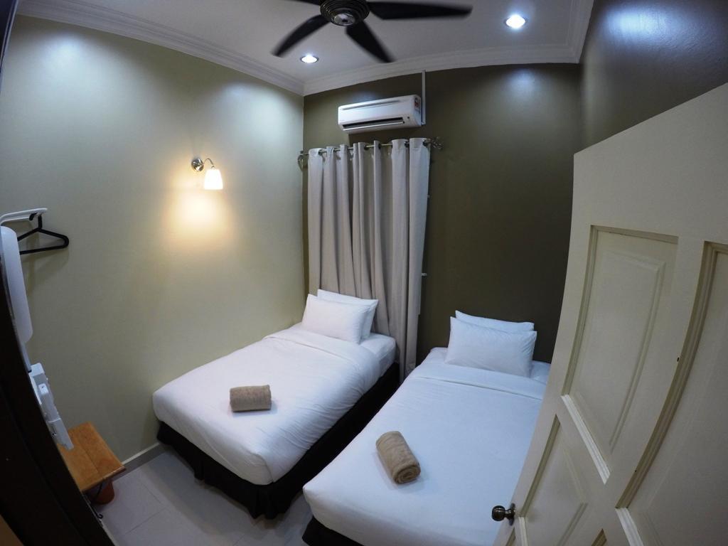 Wan's Beach Guest House Dungun Zimmer foto